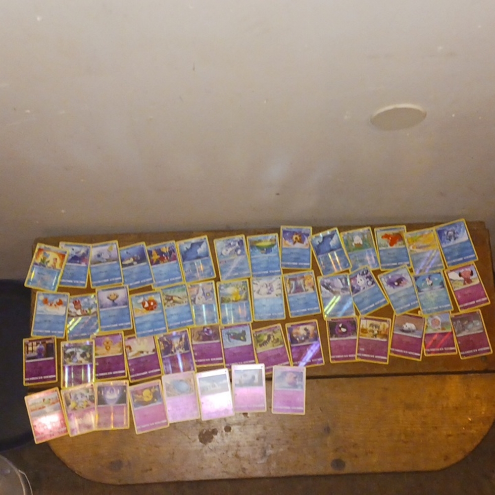 50 various foil Pokemon cards